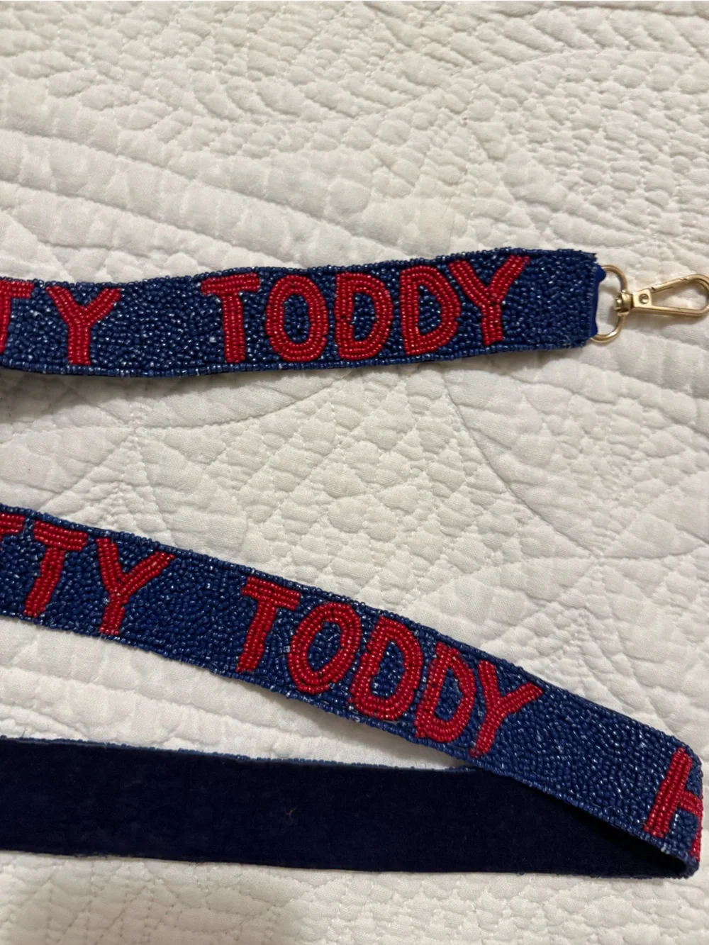 Hotty Toddy Navy Beaded Strap with Red Lettering